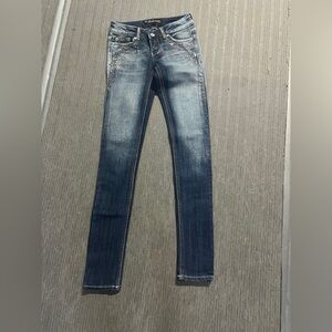 Blue Skinny Jeans with Faded Distressing